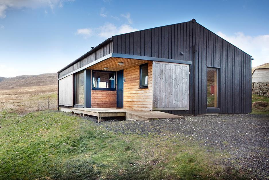 retreat from society and relax in these idyllic cabins around the world black shed 4
