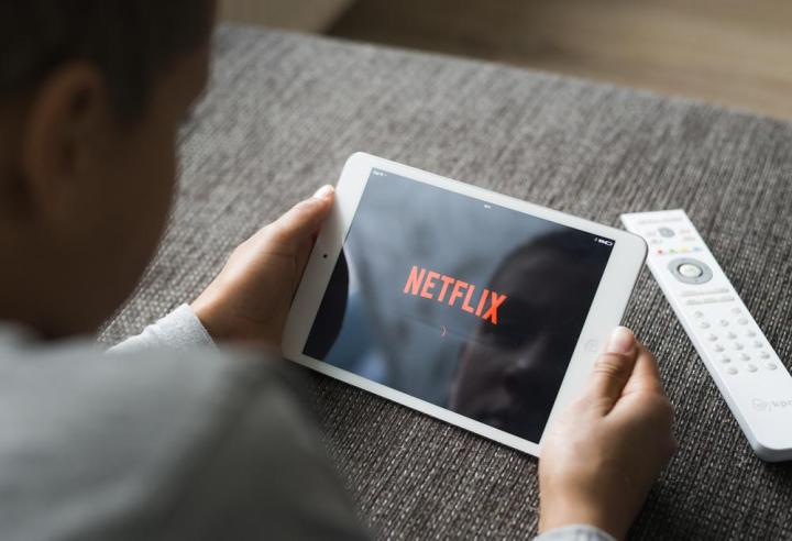 The Netflix logo on a tablet screen.