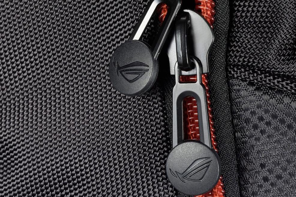 Close up view of a zipper on an Asus ROG Nomad V2 backpack.