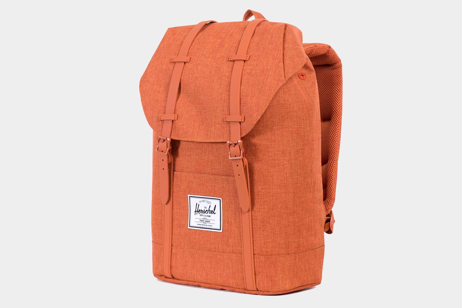 A profile view of a Herschel Supply Co Retreat backpack.