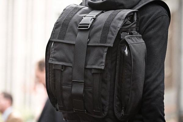Another close up rear view of person wearing a Mission Workshop R6 Arkiv Field Pack.