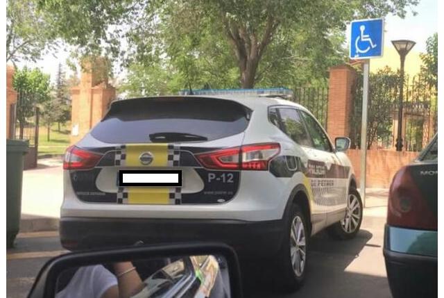 woman fined for posting facebook photo of cop car in disabled space spain