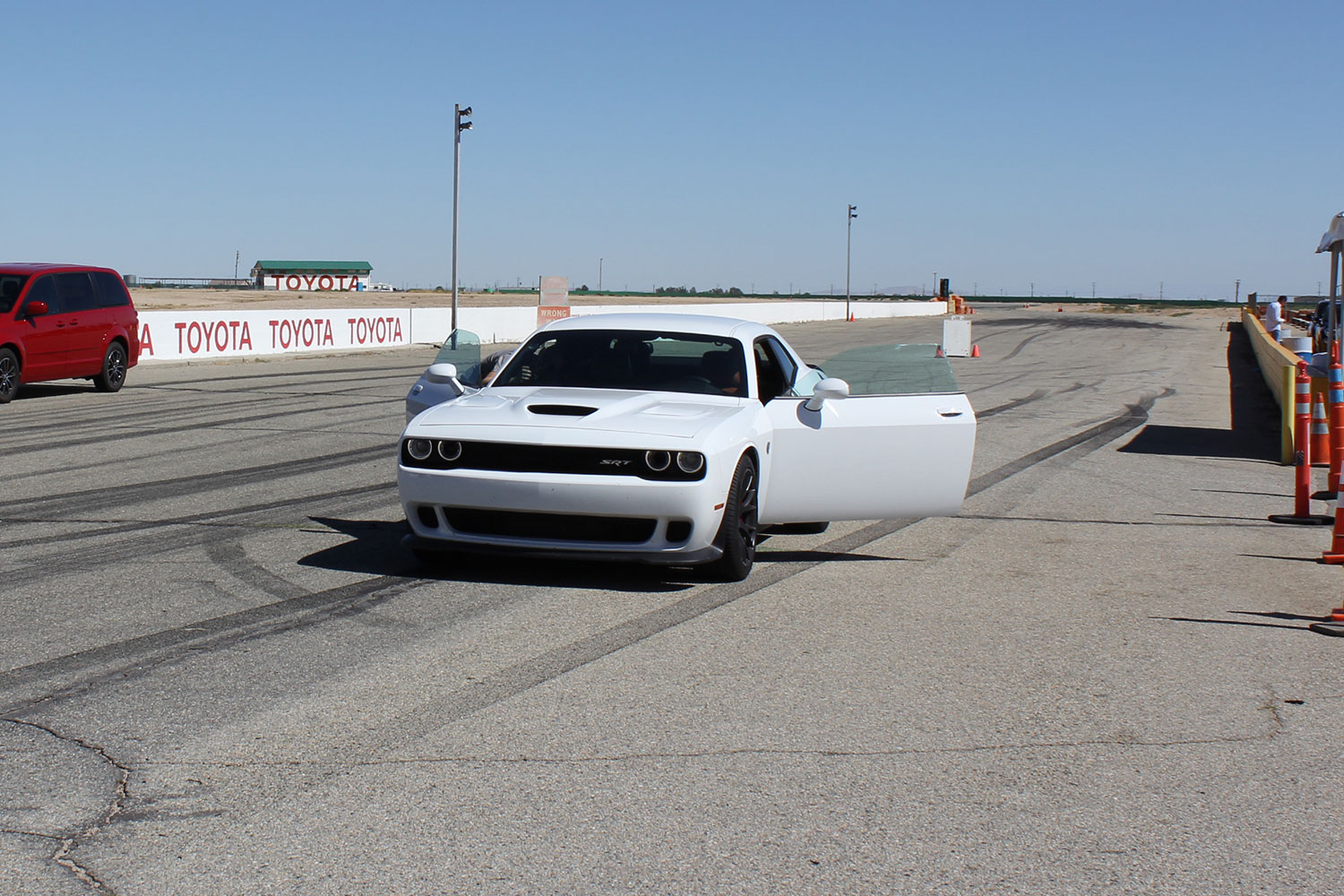 2015 dodge charger challenger srt hellcats track review and hellcat on front doors open