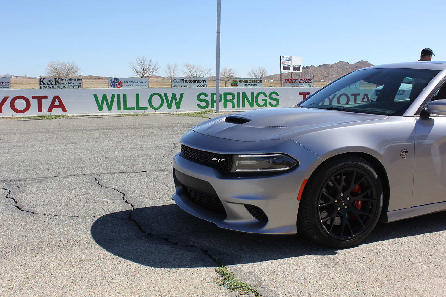 2015 dodge charger challenger srt hellcats track review and hellcat on silver front