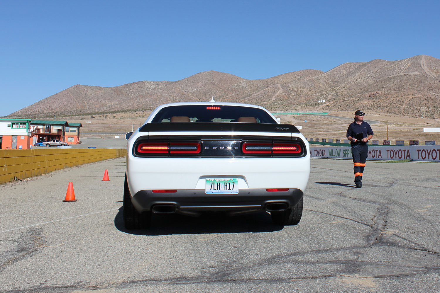 2015 dodge charger challenger srt hellcats track review and hellcat on white back