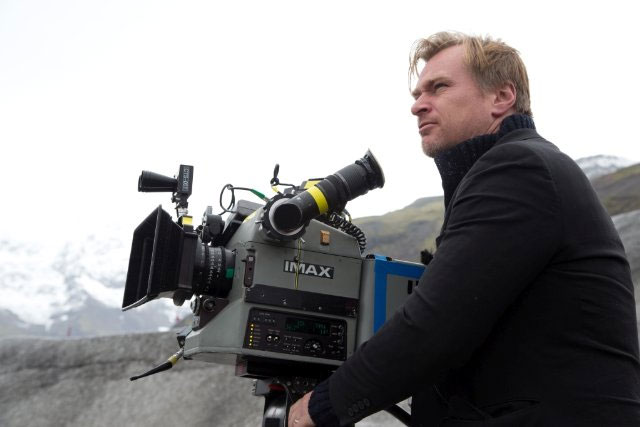 Christopher Nolan with a film camera.