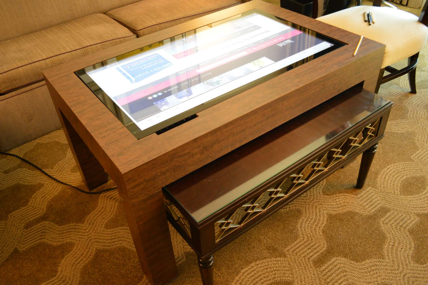 cima wants to put 40 inch touchscreens in coffee tables table far view