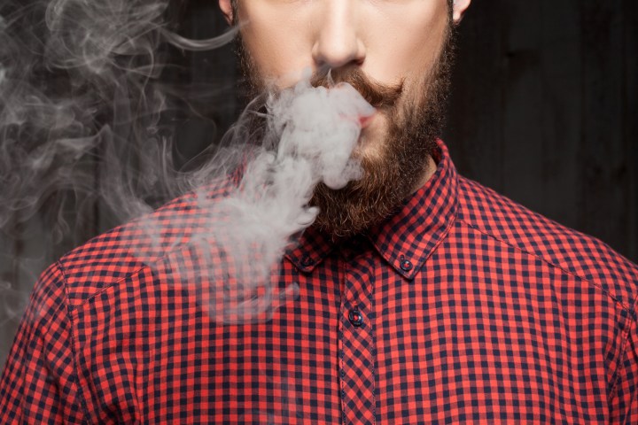 instagram marijuana laws cheerful young guy with beard is smoking