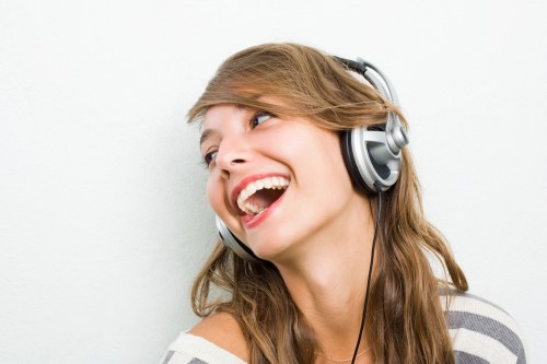 pandora premium news headphones woman listening to music spotify apple cur groove play google