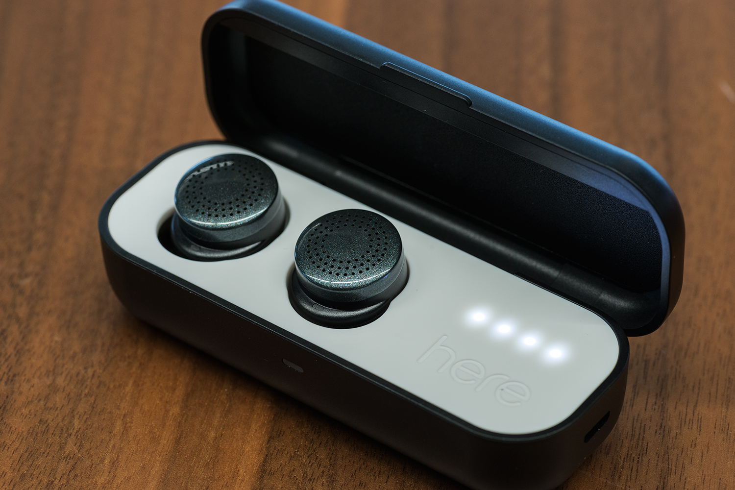 here active listening system hands on earbuds caseopen v2