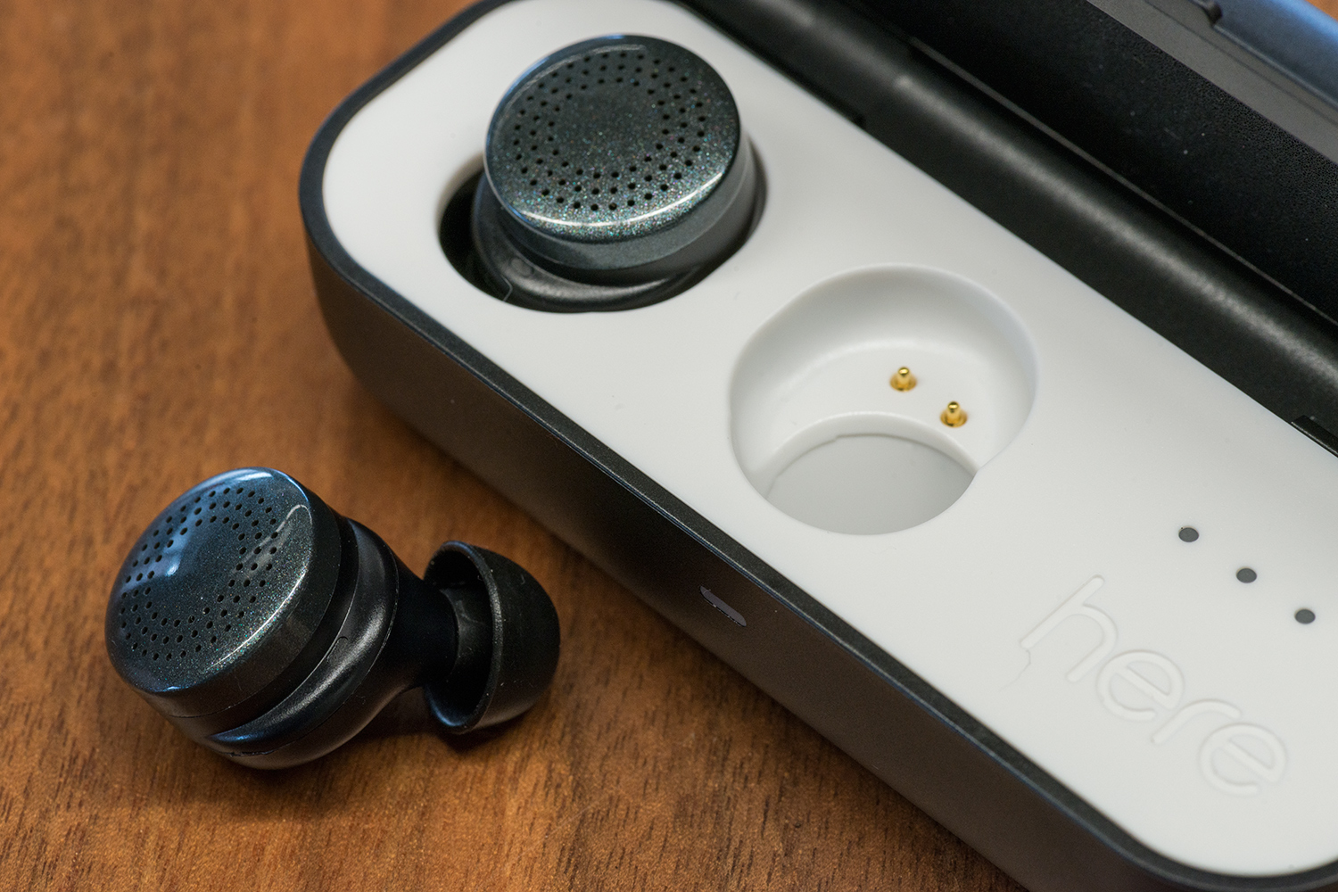 here active listening system hands on earbuds caseopen v3
