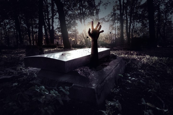 hand rising out of grave
