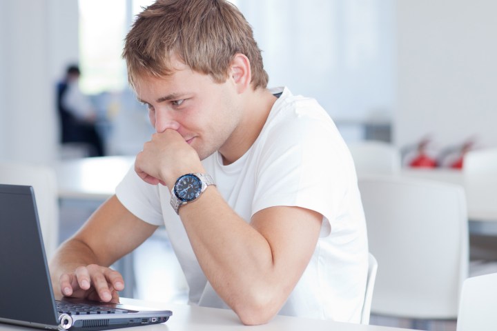 uk government age verification adult website news tense man looking at computer