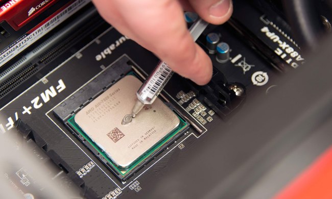 Thermal paste application on CPU.