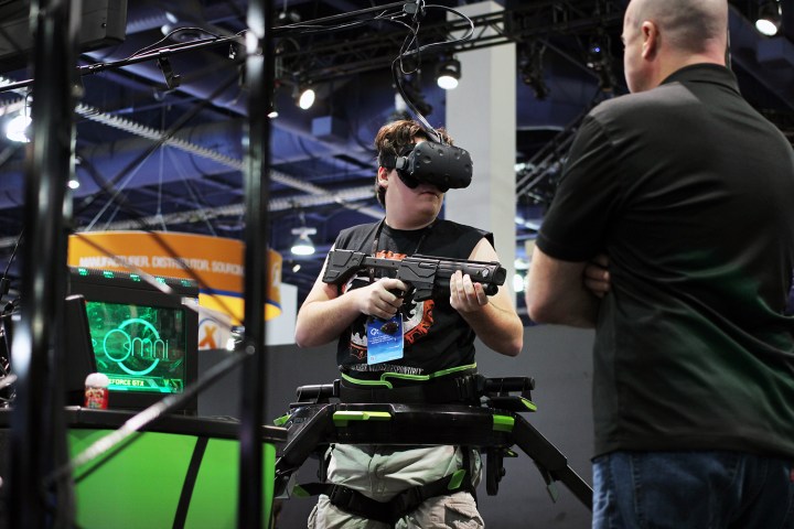 virtual reality and exclusivity palmer luckey playing with virtuix omni
