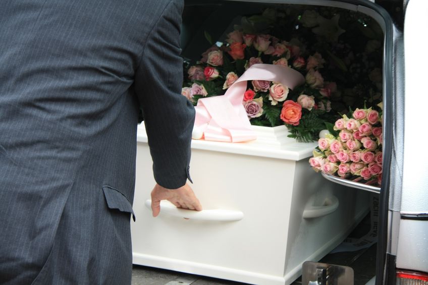 social media accounts after death white coffin funeral