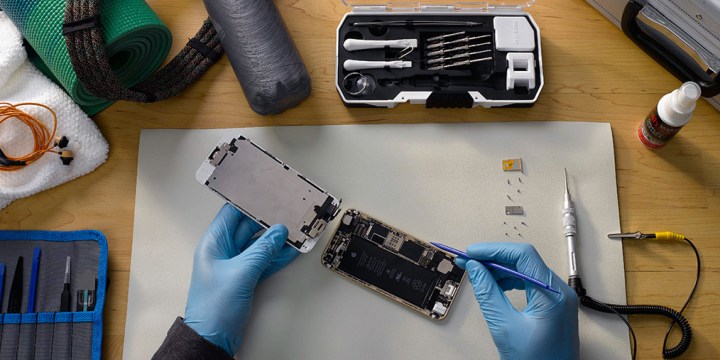 An iPhone being repaired.