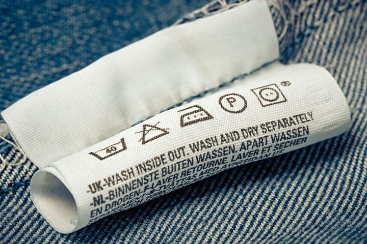 what do laundry dry cleaning symbols mean 30437917  label clothes description jeans blue background