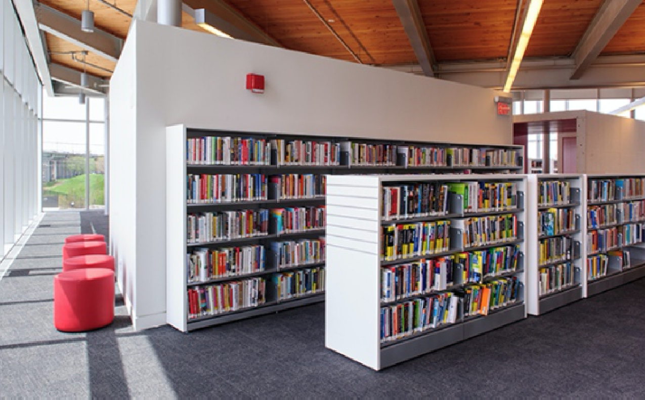 Some bookshelves in a public library