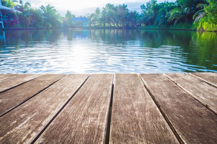 photojournalist reunited with camera after attack 47417744  antique wooden pier on the lake sunlight effects