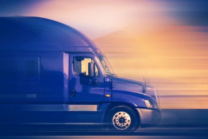 nhtsa dot trucking industry truck bus speed limiters rush  speeding blue semi on the american highway