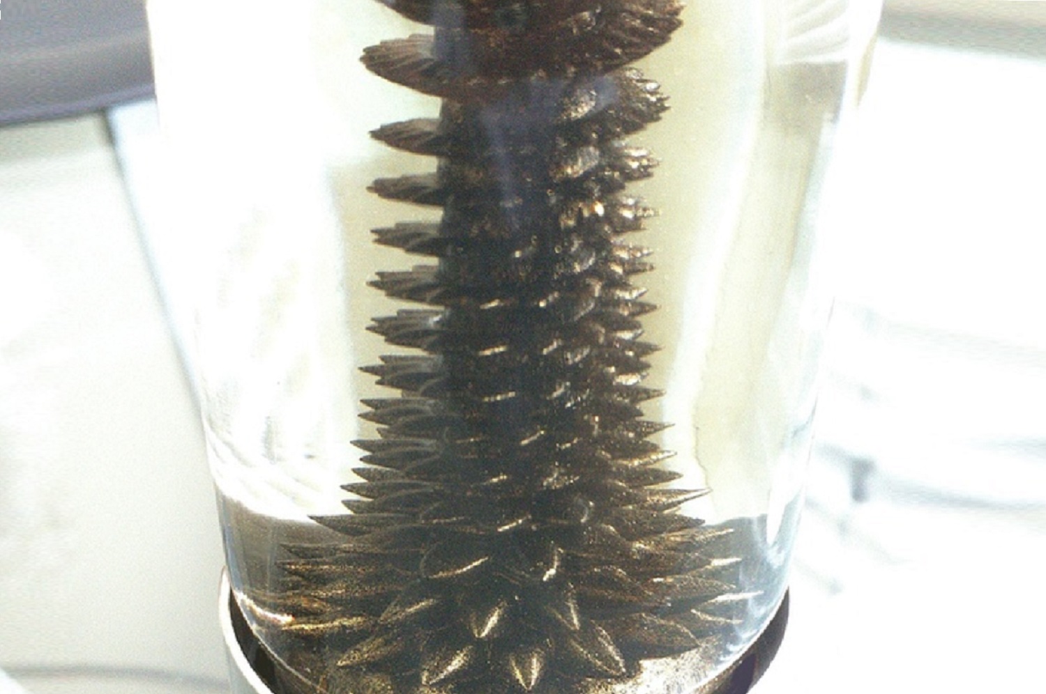 ferrofluid desk ornament gold