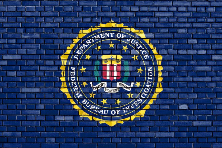fbi warning internet connected toys 50106167  flag of painted on brick wall