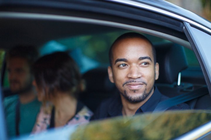 uber promotes multiple transportation solutions uberpool man looking out