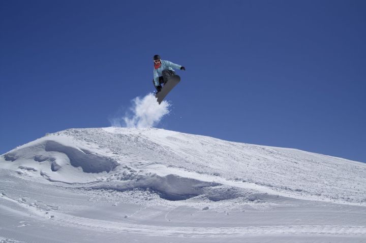 italian safer ski jump 12119424  snowboarder jumping in terrain park