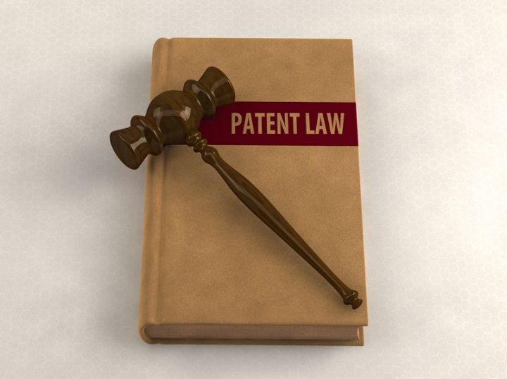 canon patents 2016 14854497  gavel on a patent law book conceptual illustration