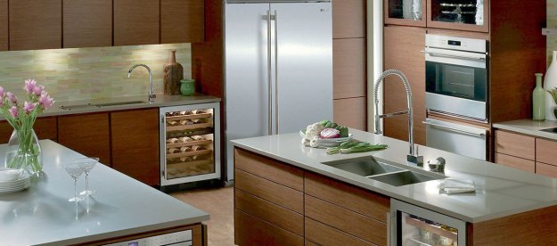 Stainless steel refrigerator in kitchen.