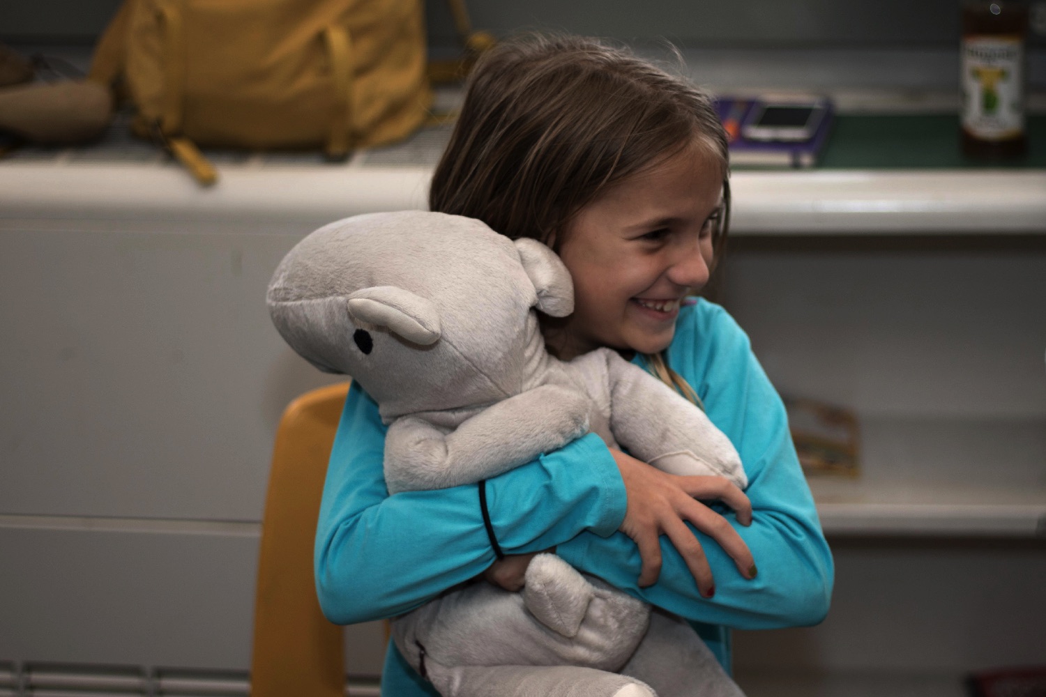 parihug stuffed animal kickstarter little girl hugging pari