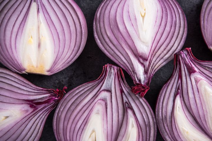 startup to network thwart snooping 56354293  red onion halves texture details and pattern flat lay from above