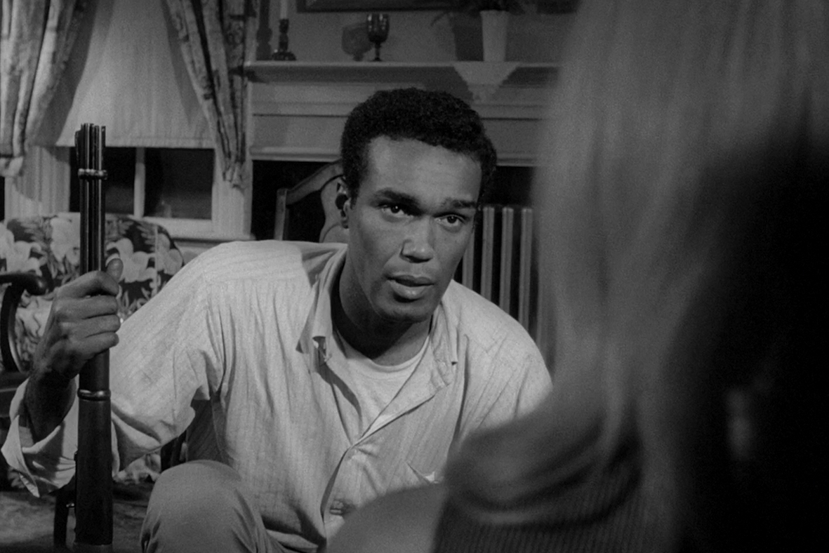 Sam holding a gun in "Night of the Living Dead' (1968).