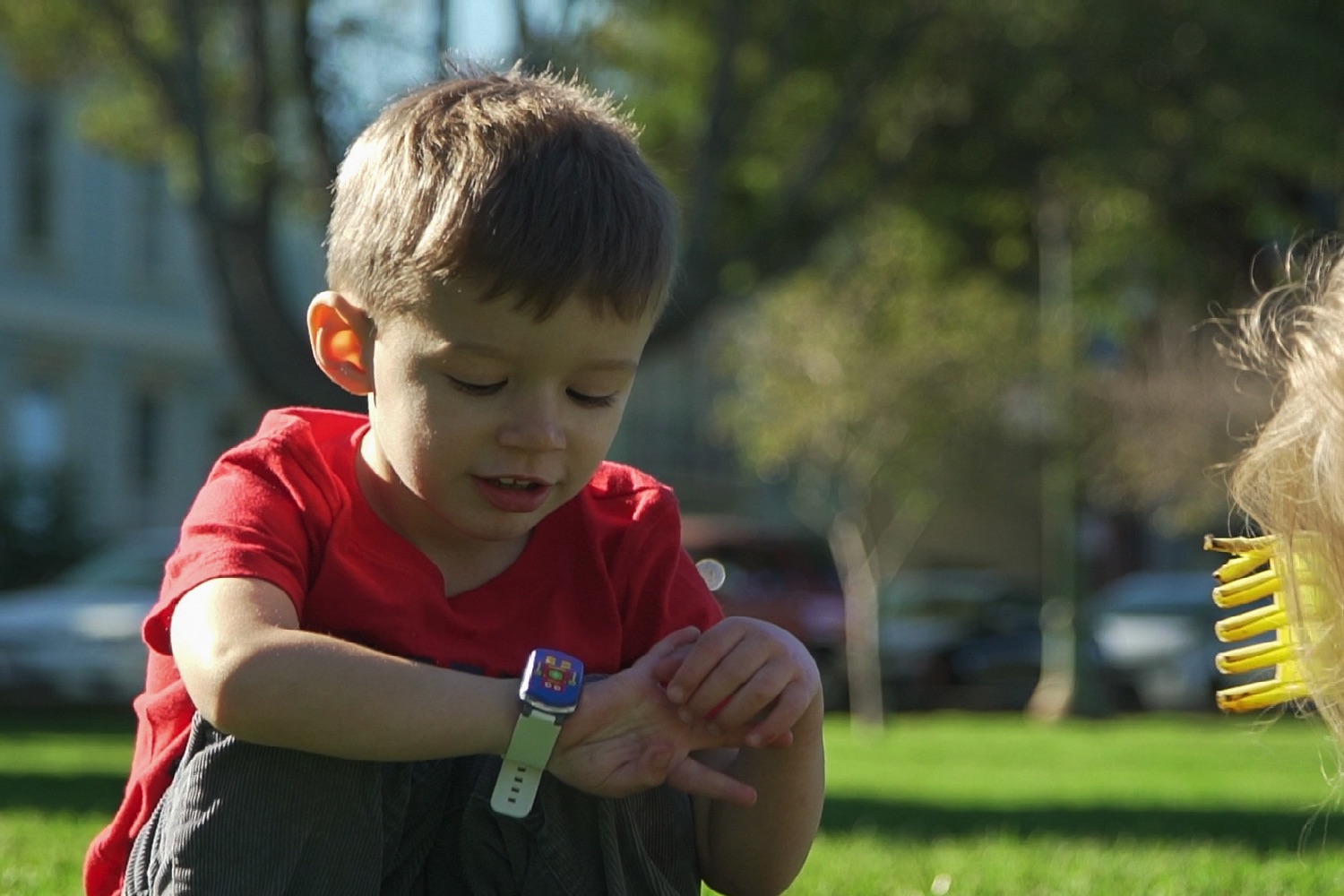 quantified kid wearable tech boy with kiddo  outdoors 1