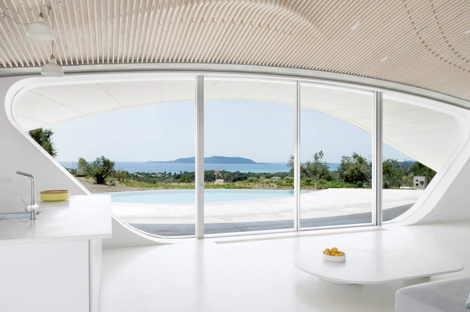 lassa architects villa ypsilon living room island view1
