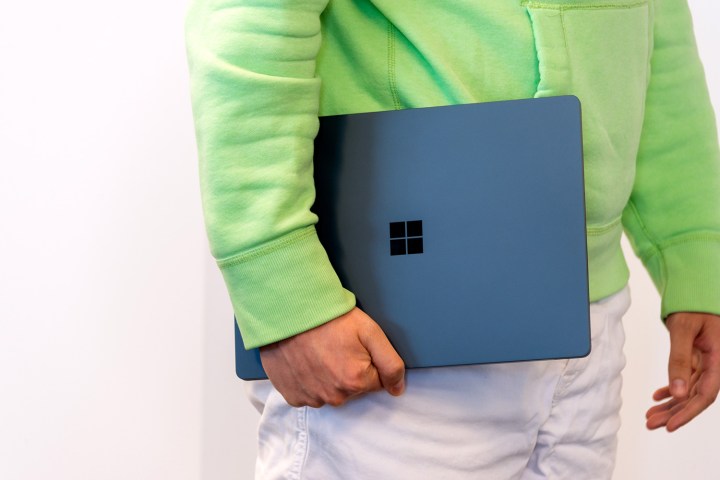 Microsoft Surface Laptop in hand