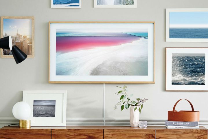 A Samsung Frame TV hangs on a wall.