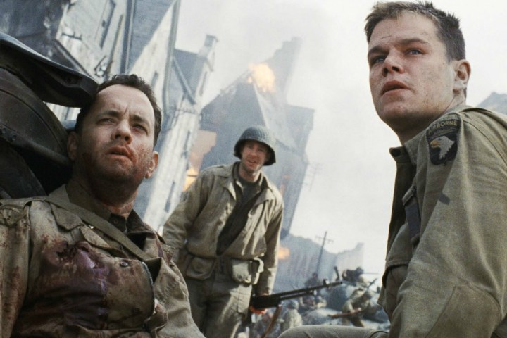 Three soldiers look determined in Saving Private Ryan.