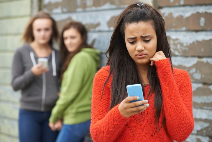 cyberbullying statistics 2017 ditch the label 45009248  teenage girl being bullied by text message