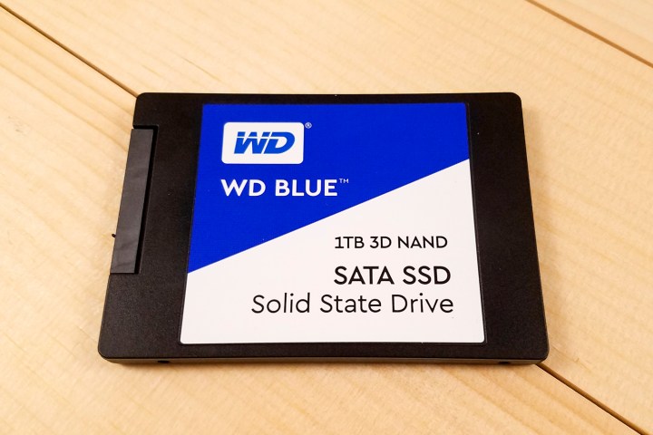 WD Blue 3D NAND SATA SSD sitting flat on a table