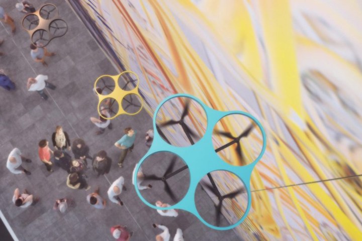 Drones at work on a Paint By Drone mural