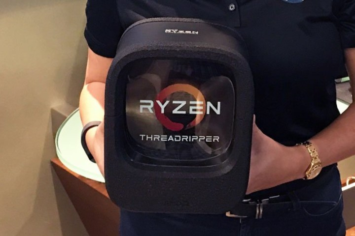 Someone holding a AMD Threadripper box.