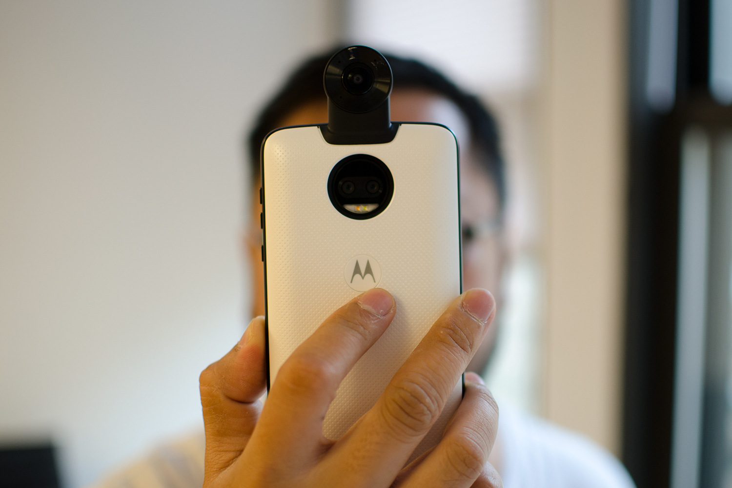 Moto 360 Camera in hand