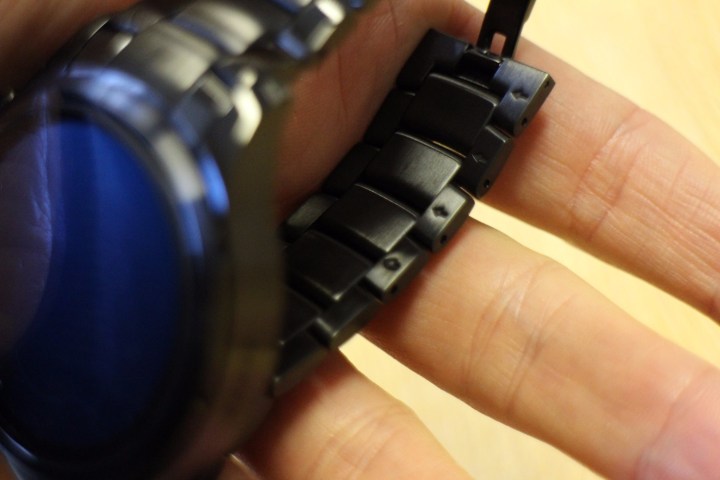 Looking at the underside of a watch strap before removing links.