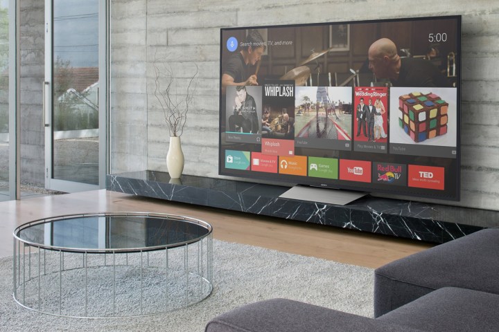 A wall-mounted TV with Netflix on the screen. 