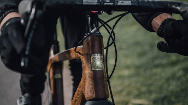 glenmorangie and renovo wooden bikes close up of signet emblem on front bike secondary shot 1500x844 jpg