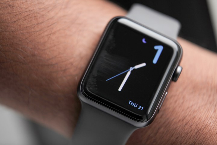 A closeup of a person's wrist wearing an Apple watch series 3.