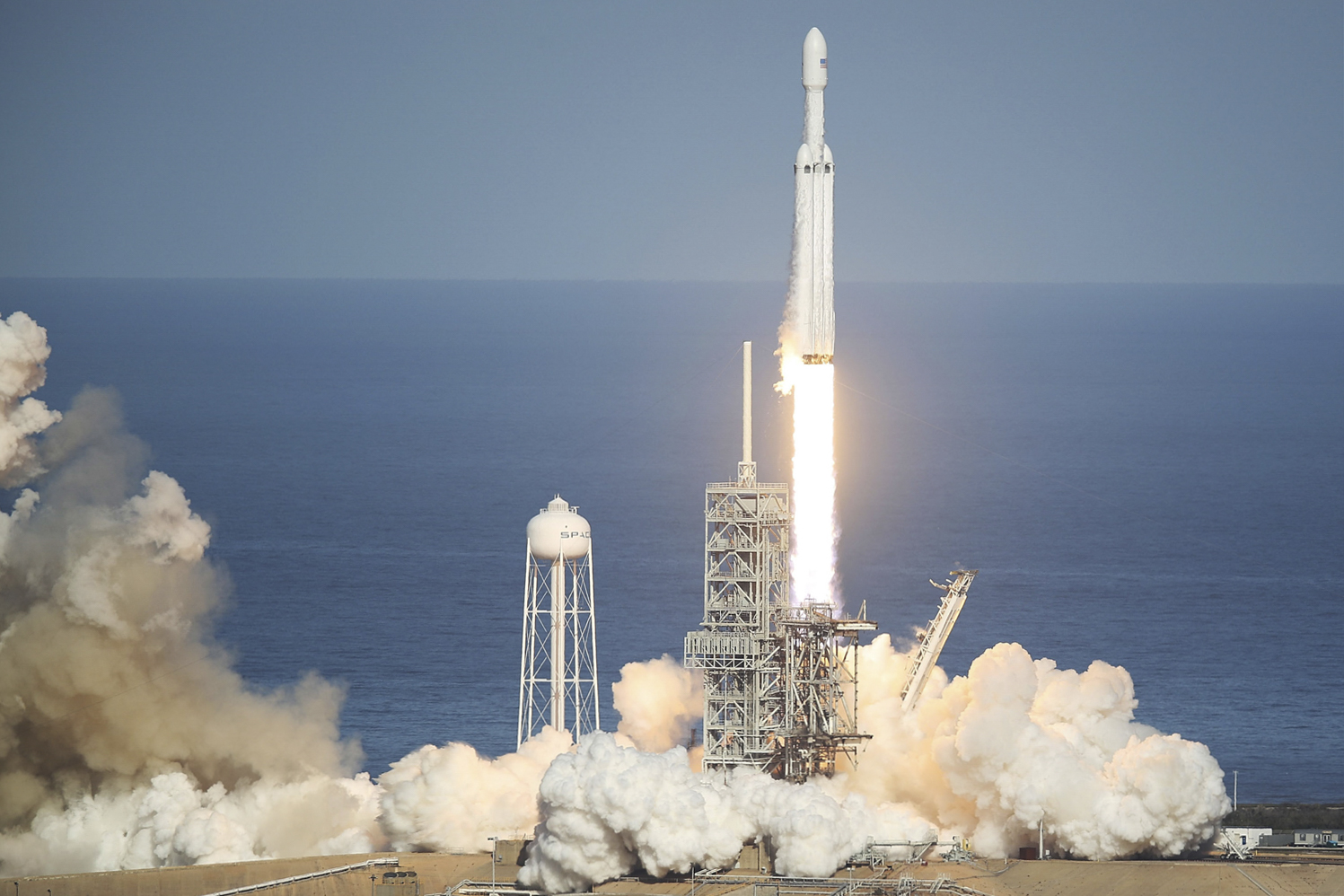 spacex falcon heavy launch success to first lift rocket in demonstration mission