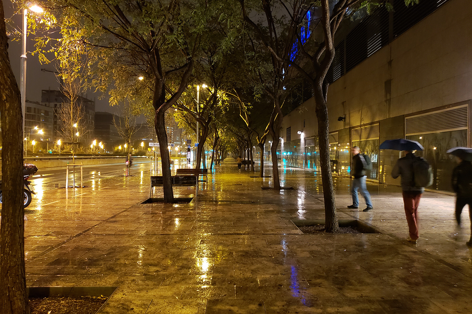 A rainy night in a city.